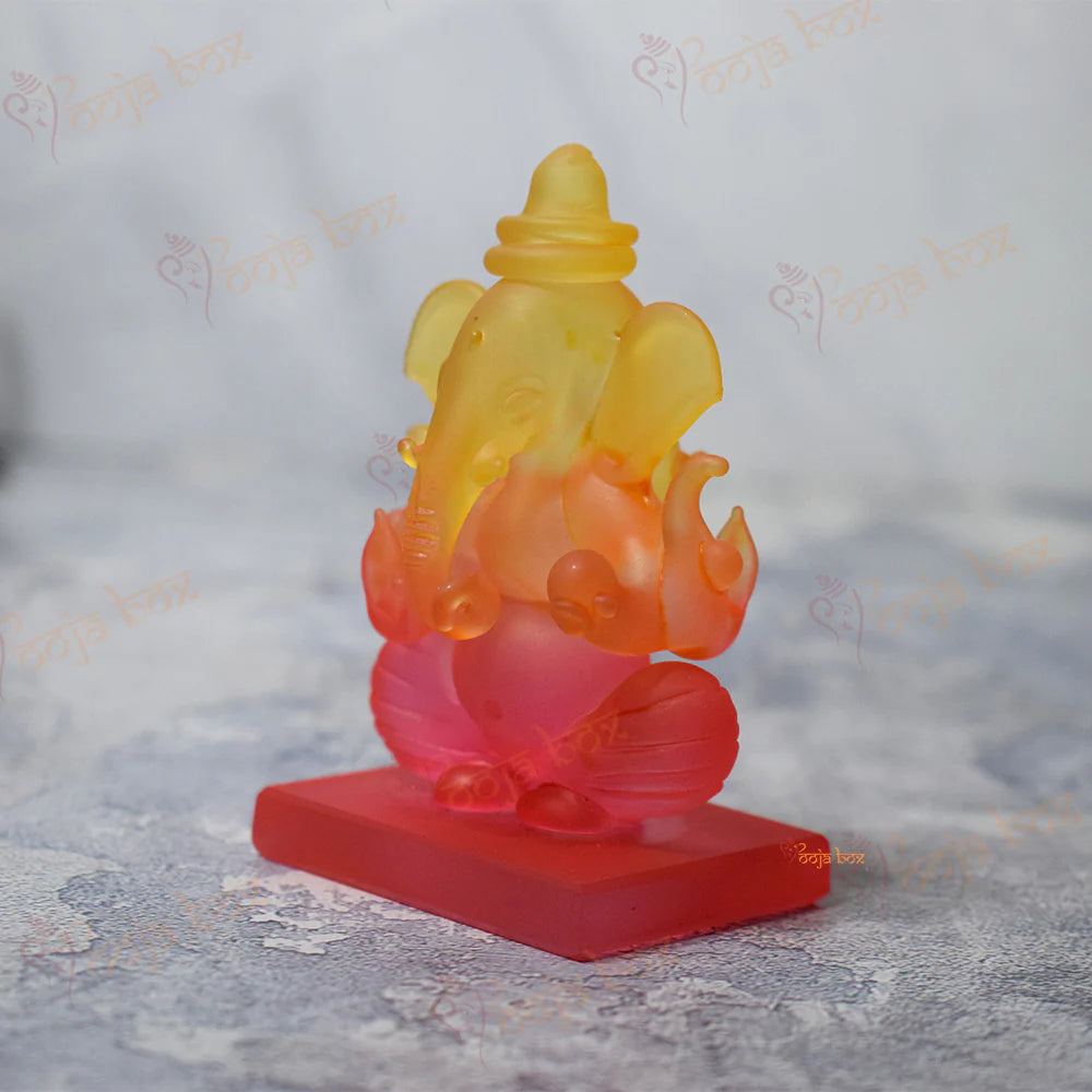 Car Ganesha Showpiece in Unheroic and Orange Double-Sided Crystal